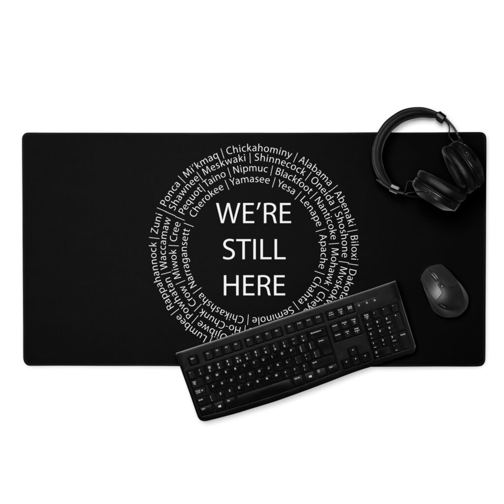 We're Still Here Desk Mat by Wayuką́