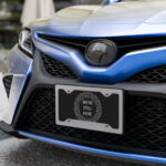 We're Still Here License Plate by Wayuką́